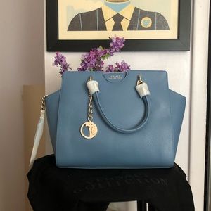 Handbag with crossbody strap